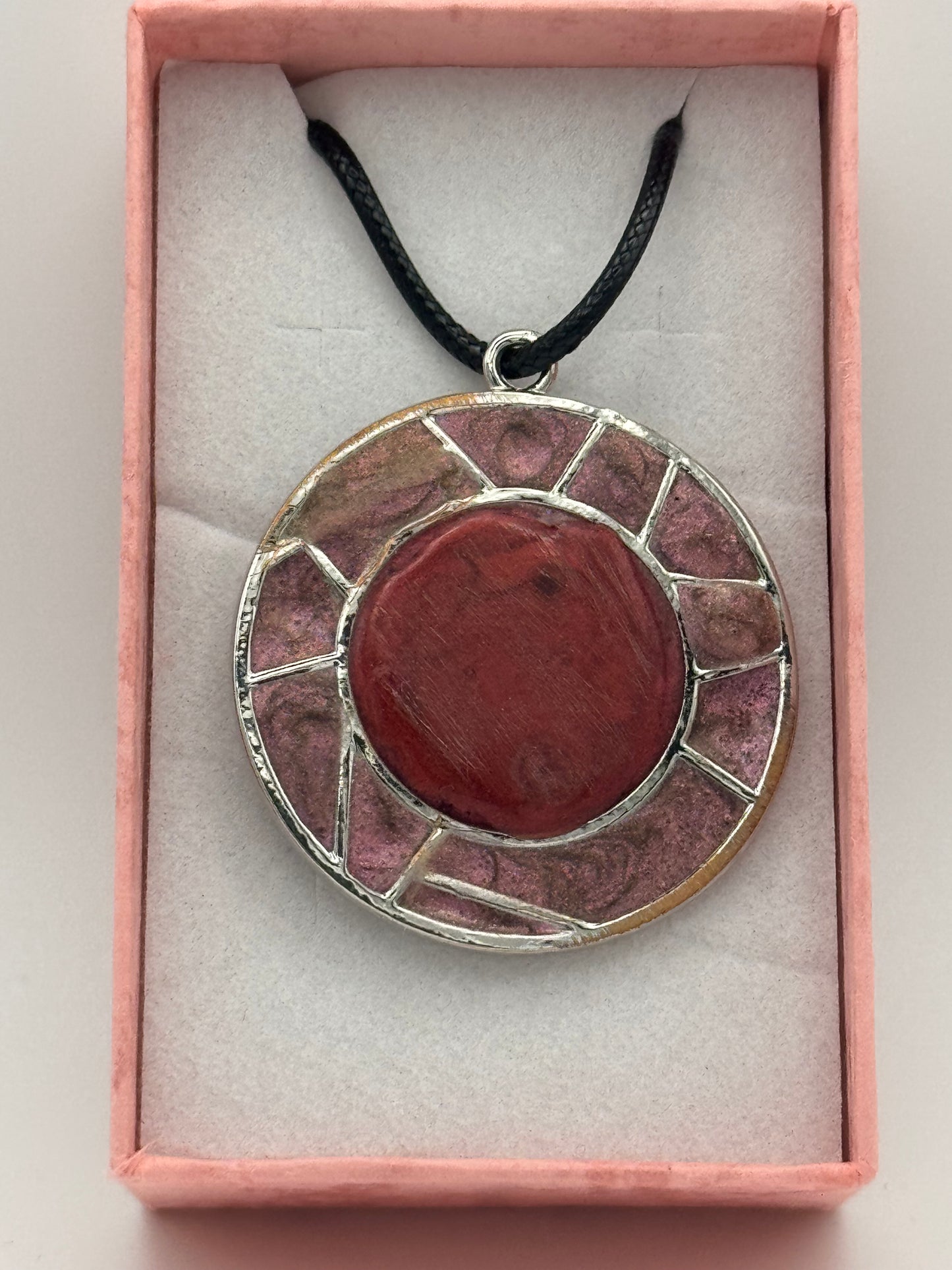 Red resin and metal bezel necklace with black waxed chain