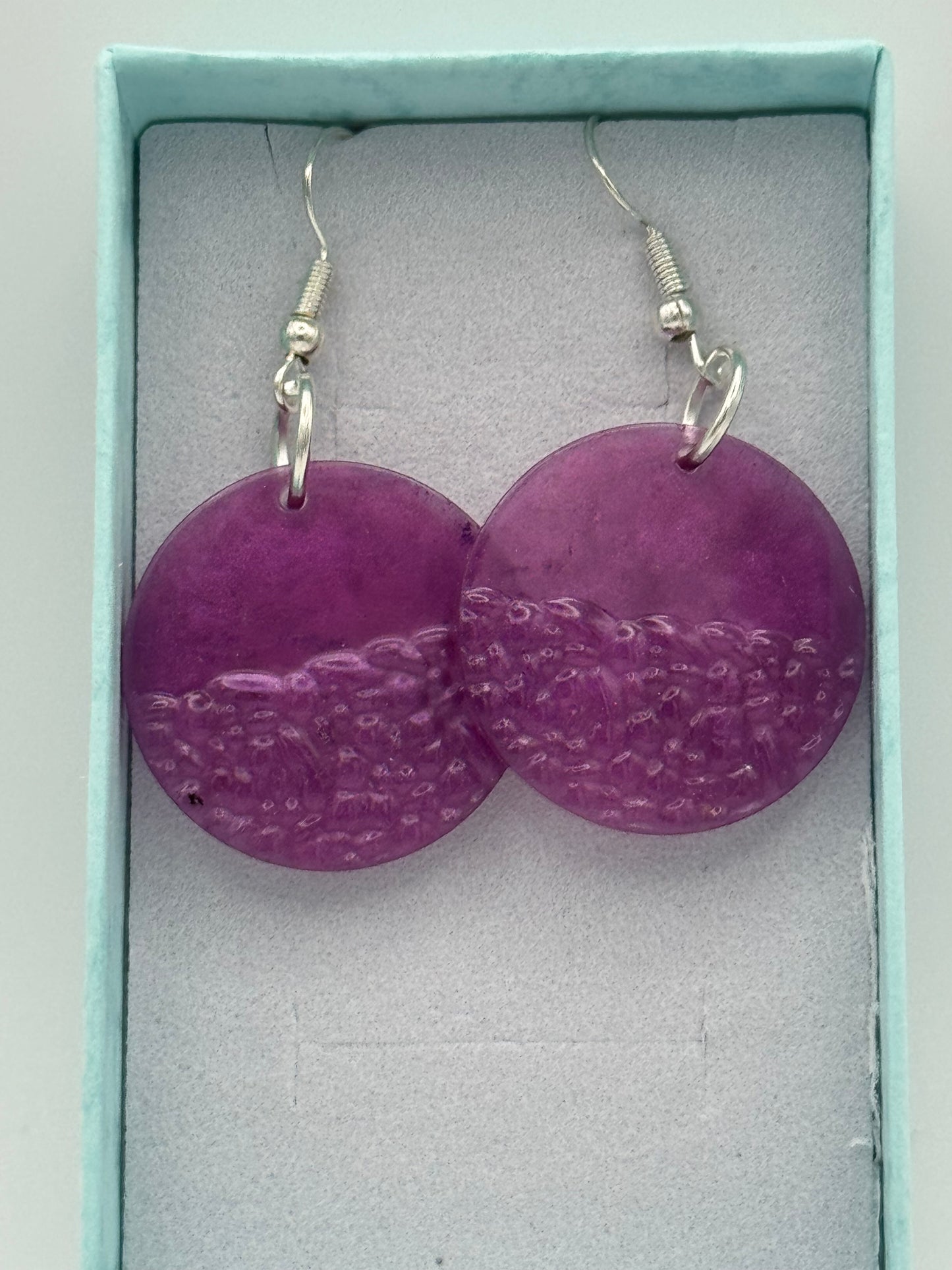 Purple circular resin earrings