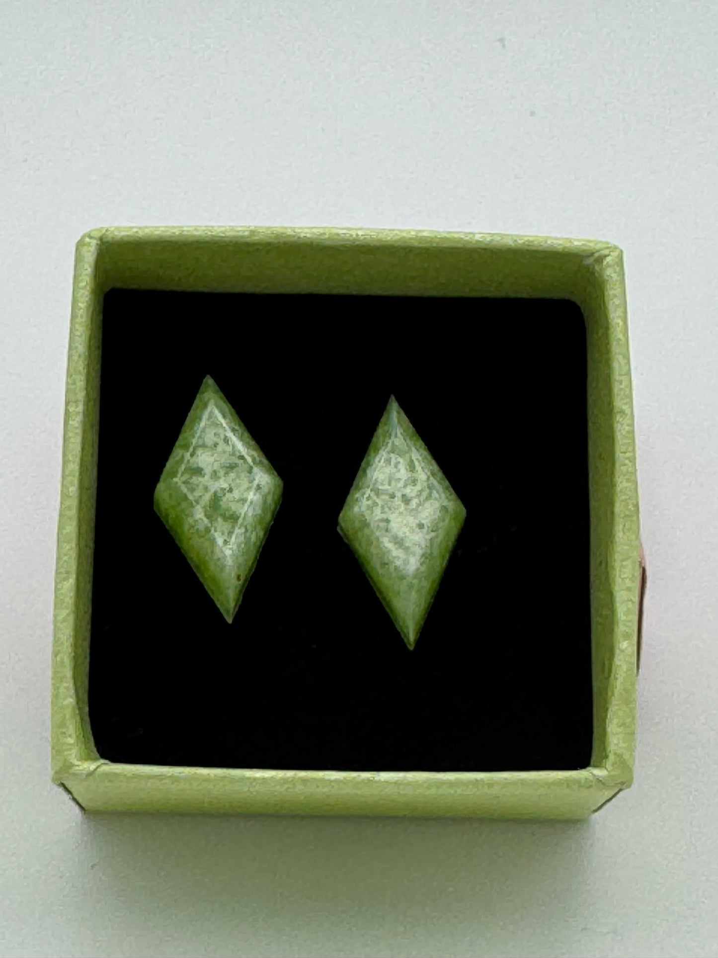 Green resin diamond shaped stud earrings