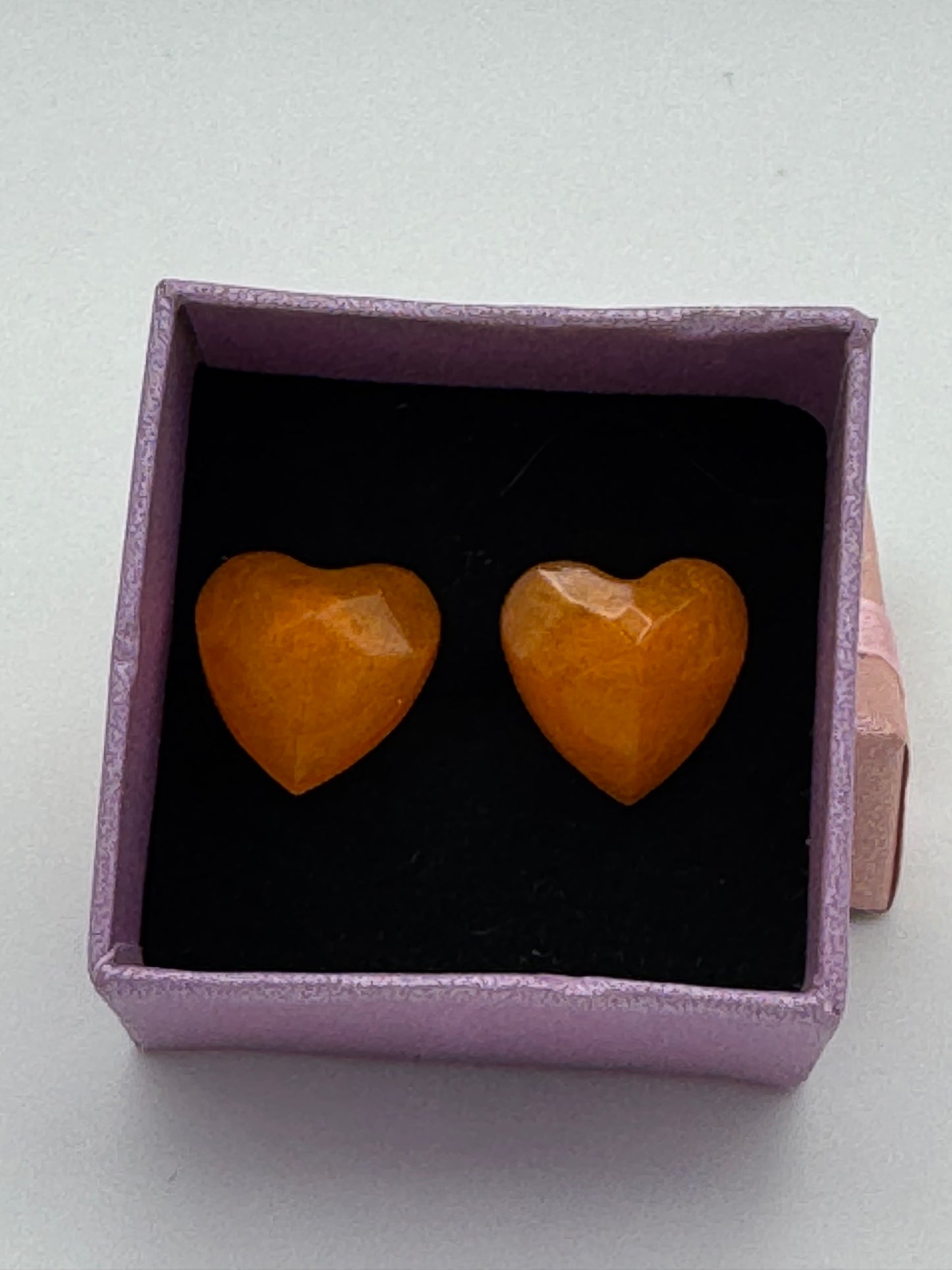 Orange resin heart shaped stud earrings