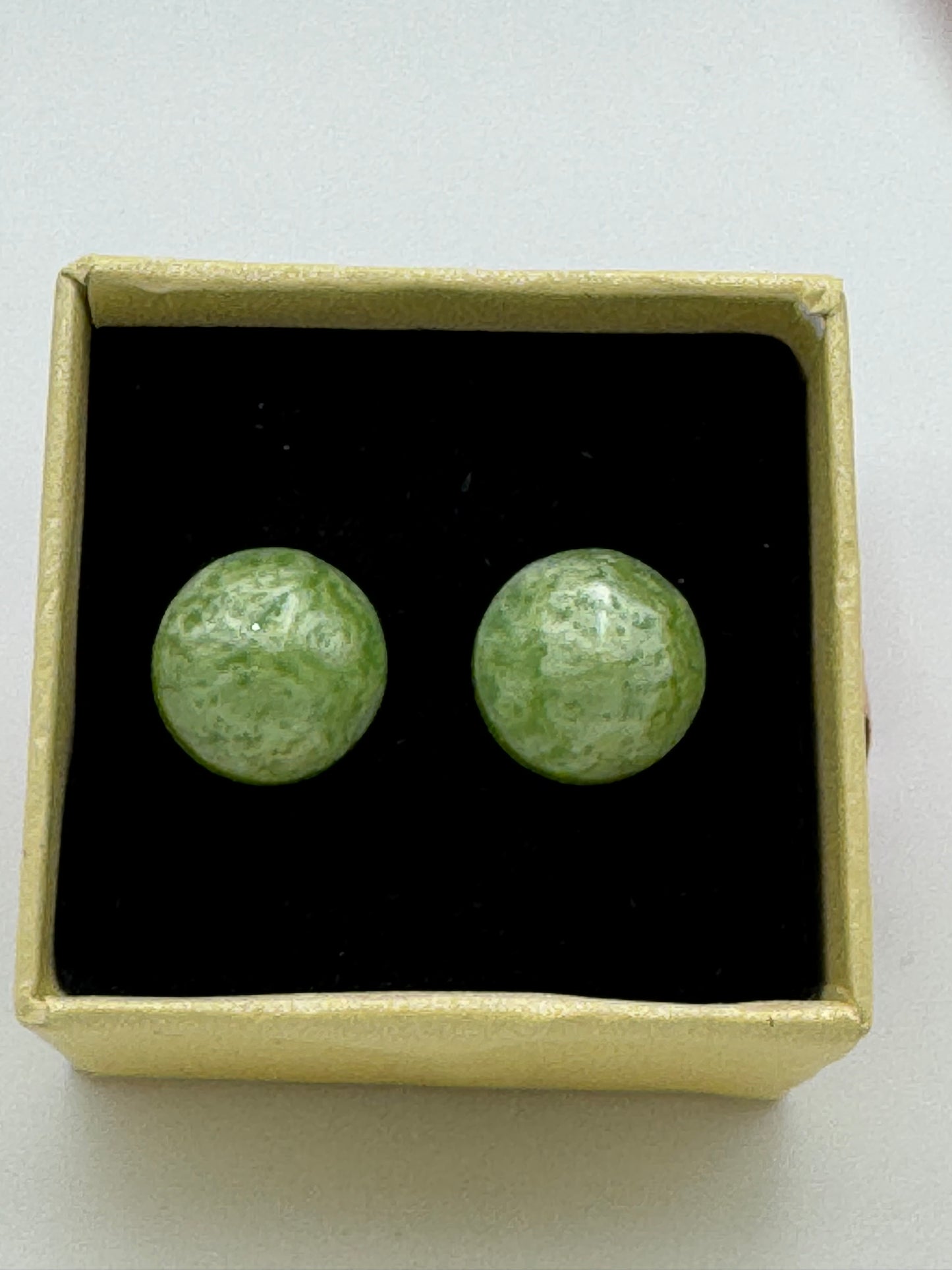 Green resin sphere shaped stud earrings