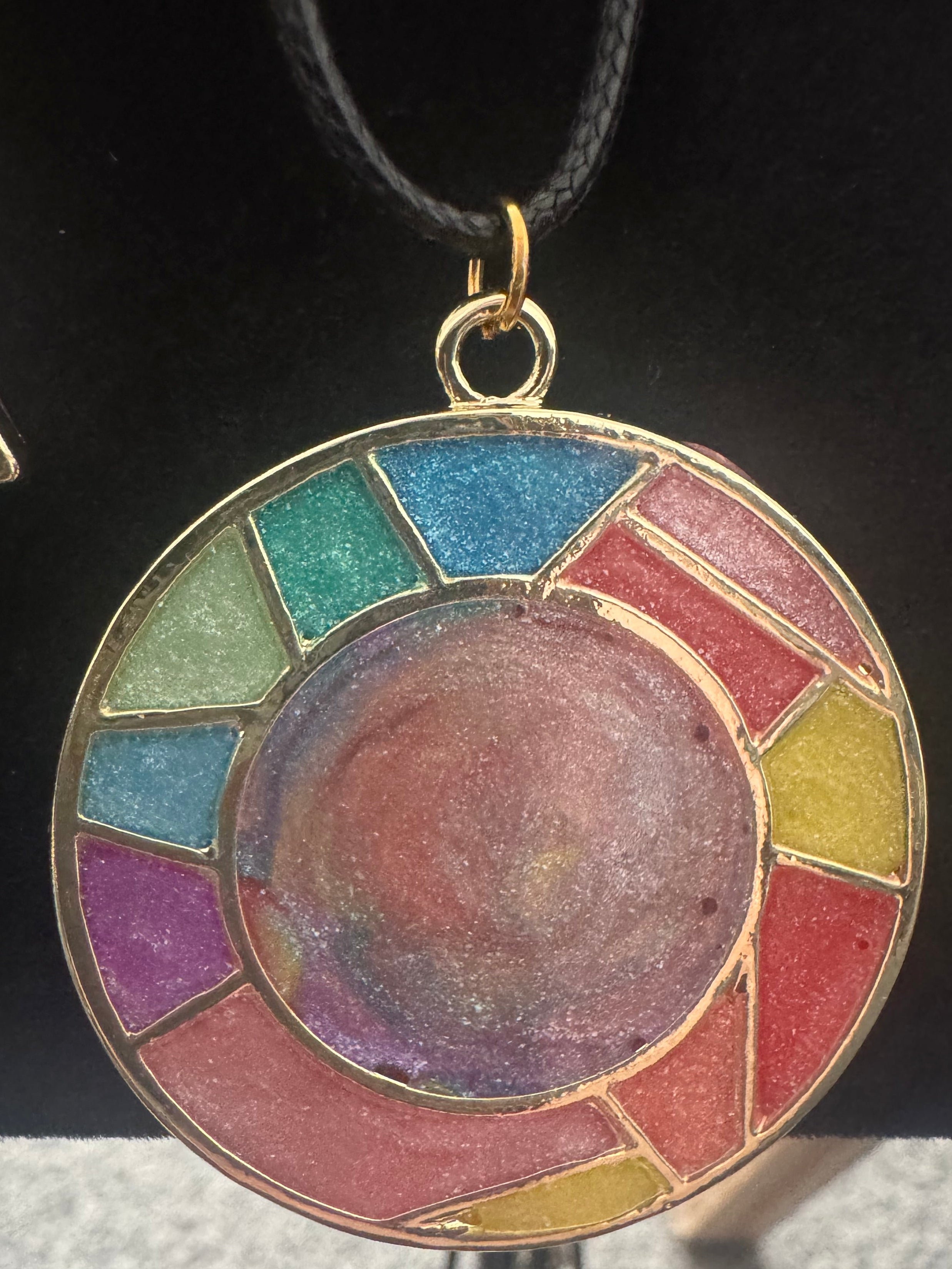 Circular metal bezel and resin necklace