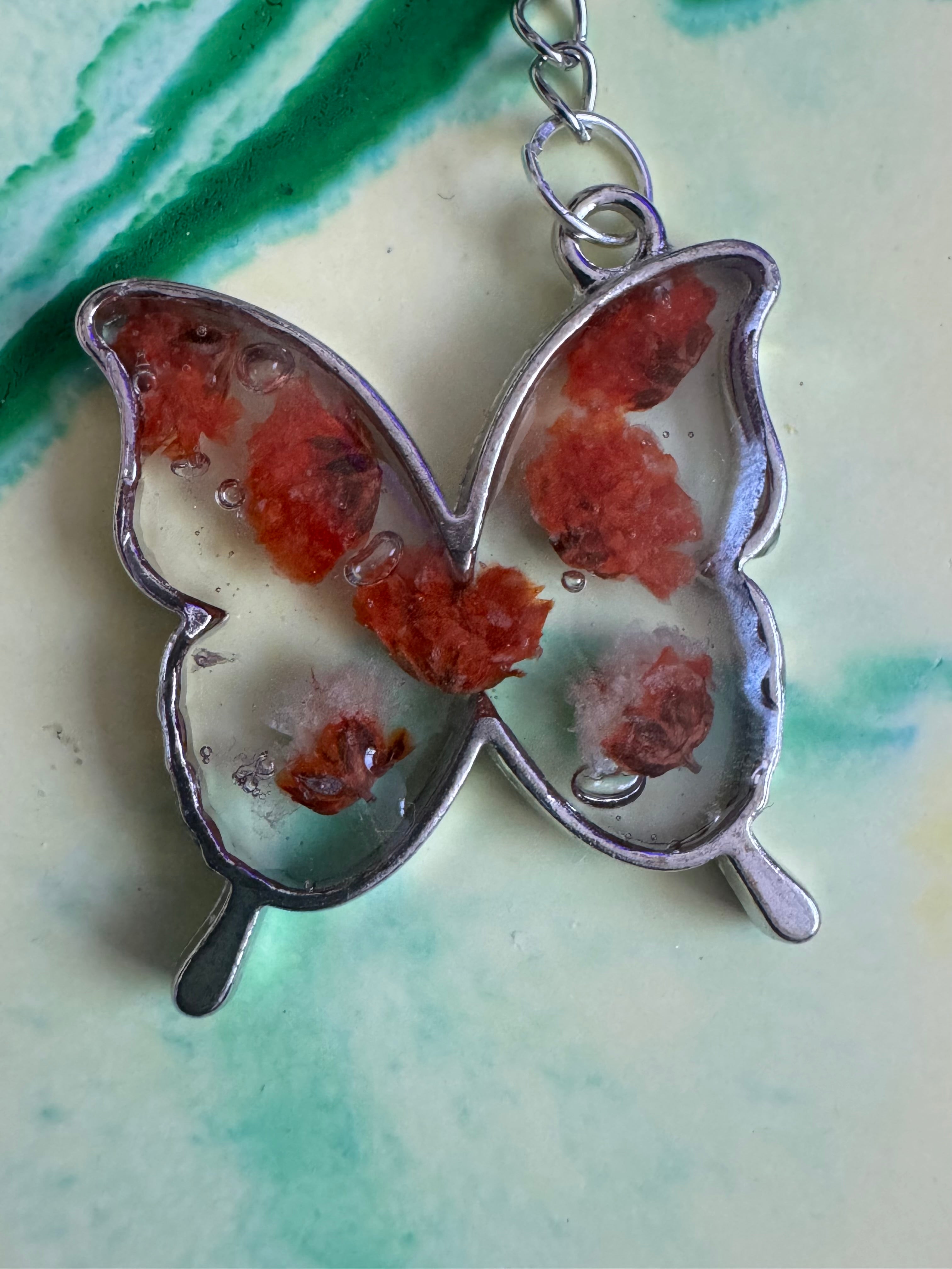 Butterfly shaped flower keyring