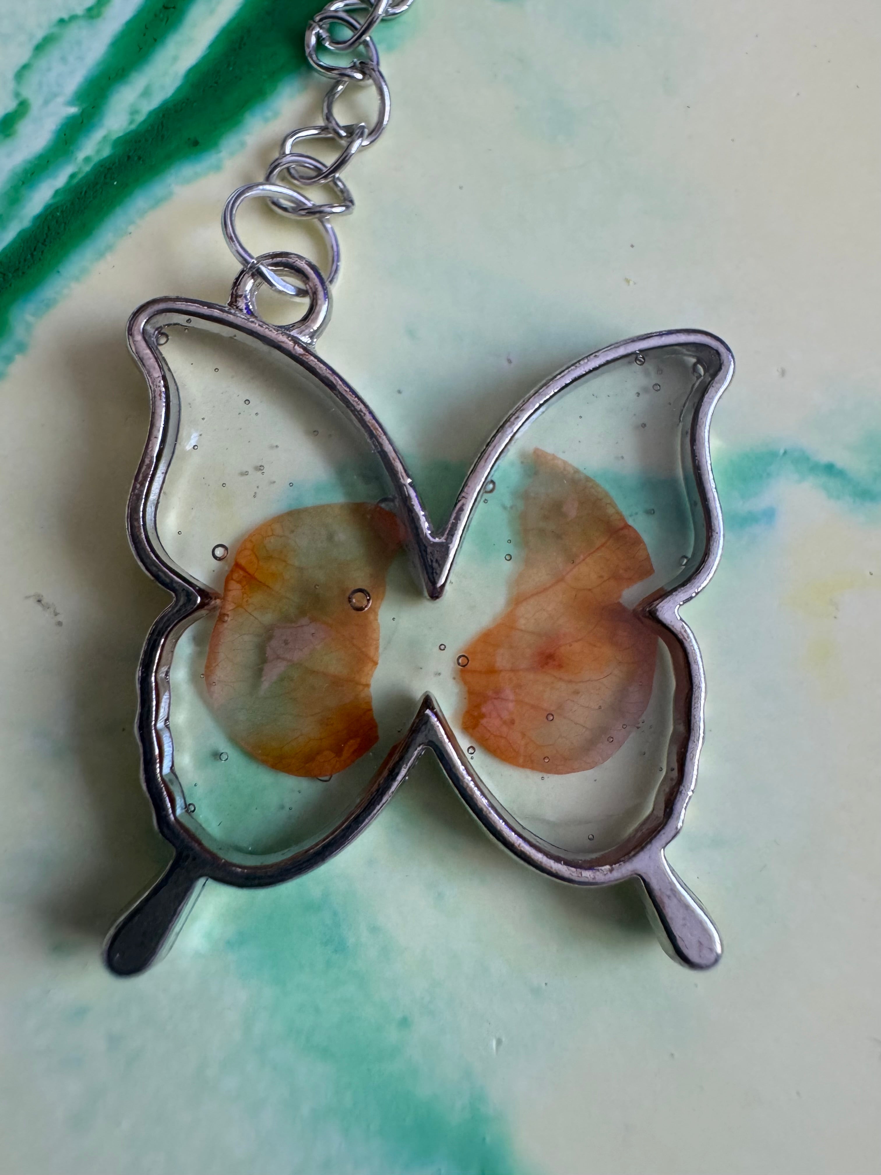 Butterfly shaped flower keyring
