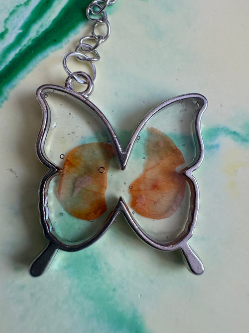 Butterfly shaped flower keyring