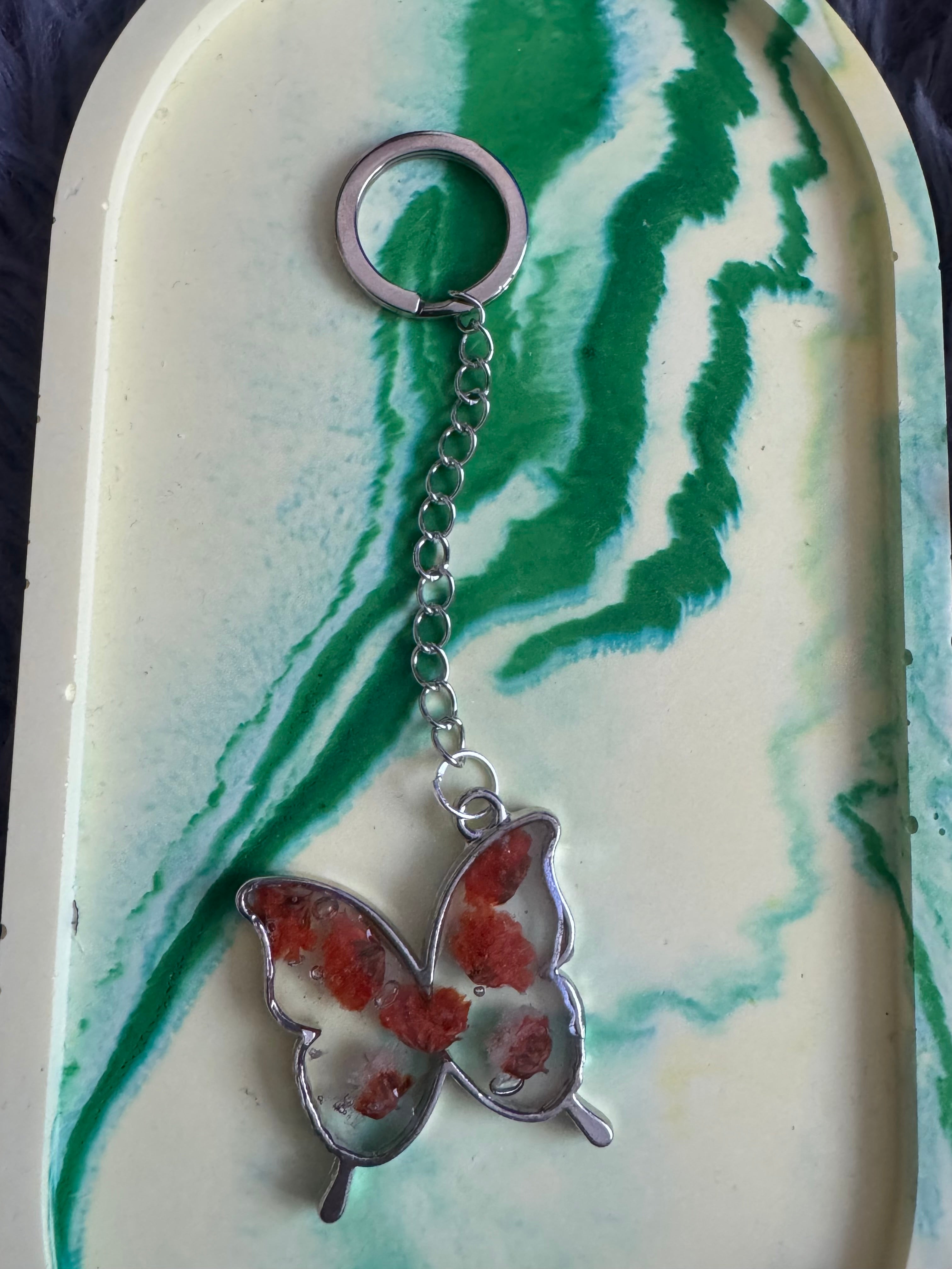 Butterfly shaped flower keyring