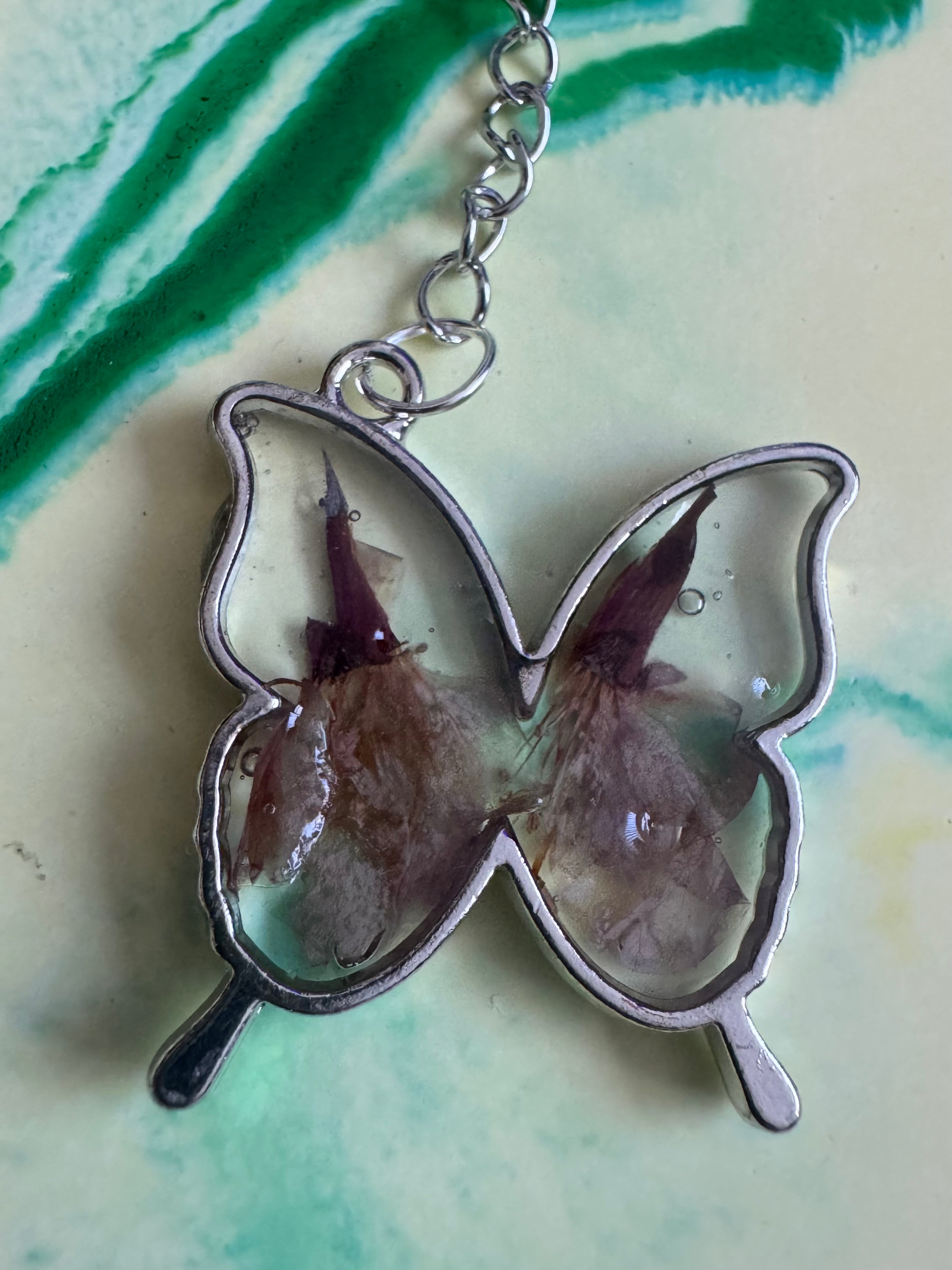 Butterfly shaped flower keyring