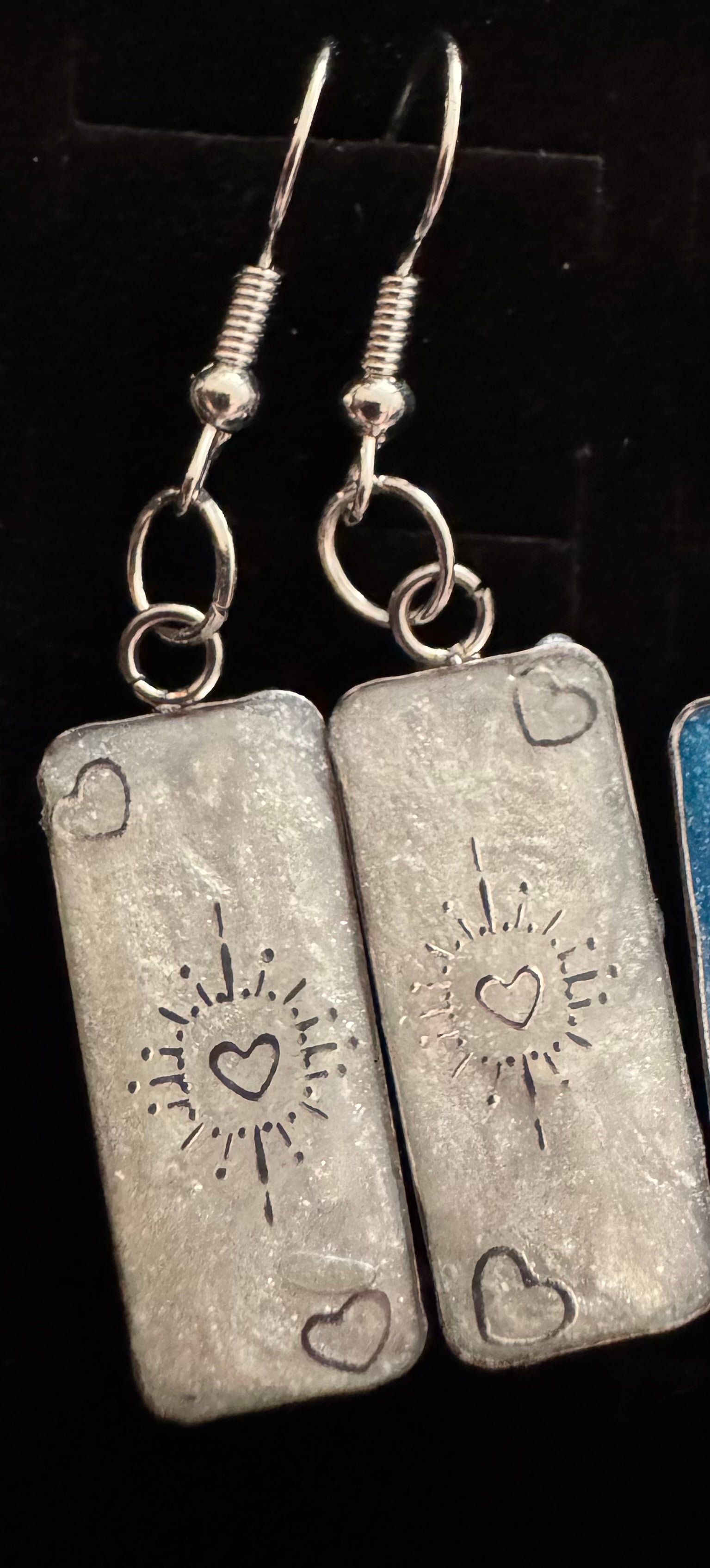 Pendant coloured earrings