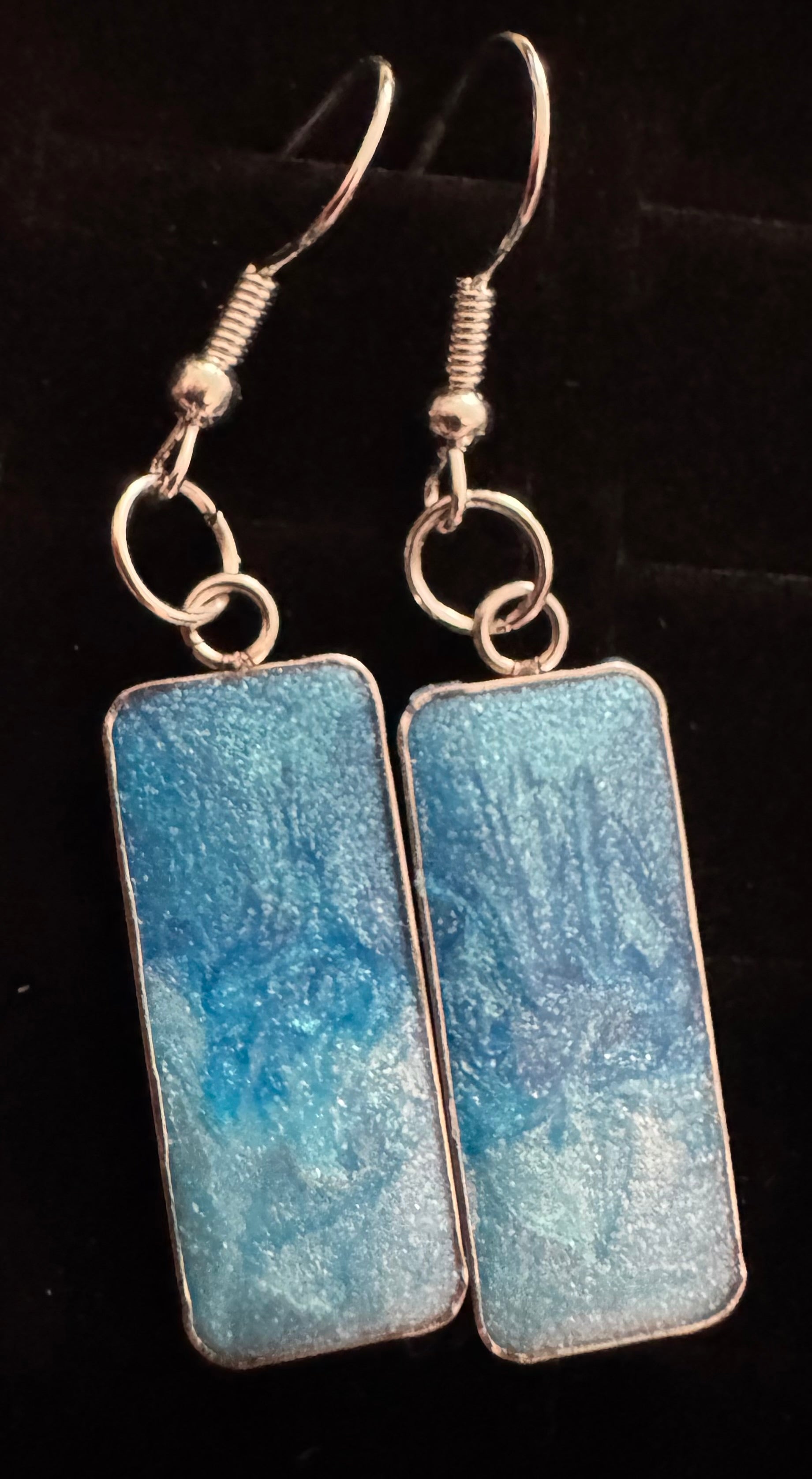 Pendant coloured earrings