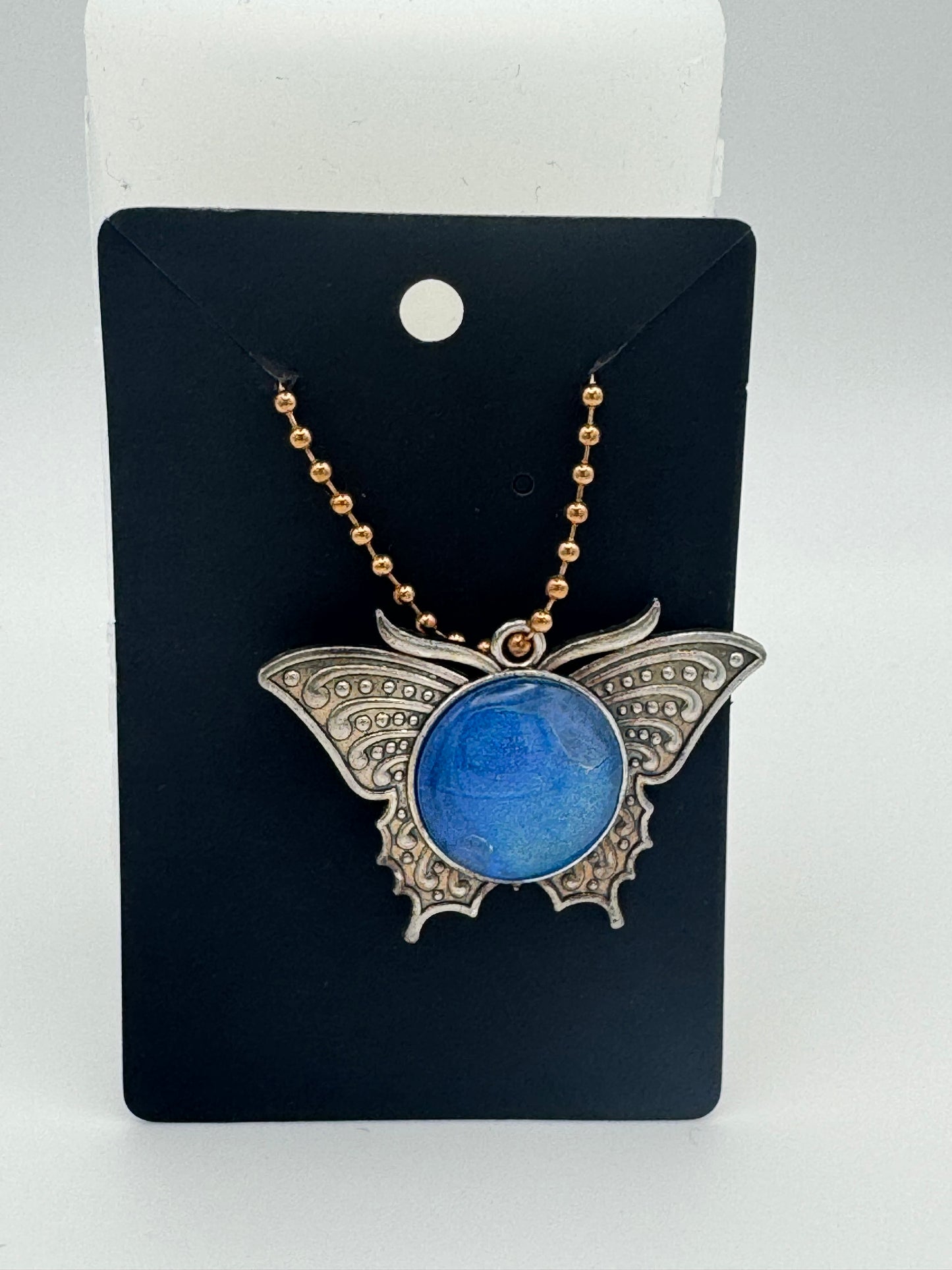 Butterfly resin and metal bag charm