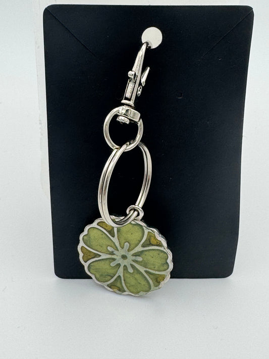 Green resin flower bag charm
