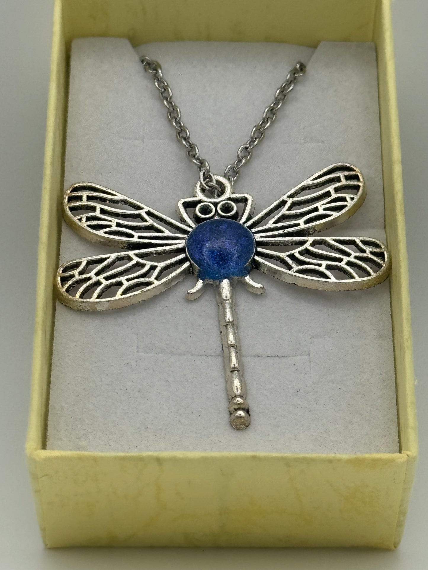 Necklace with metal dragonfly with blue resin, on stainless steel chain
