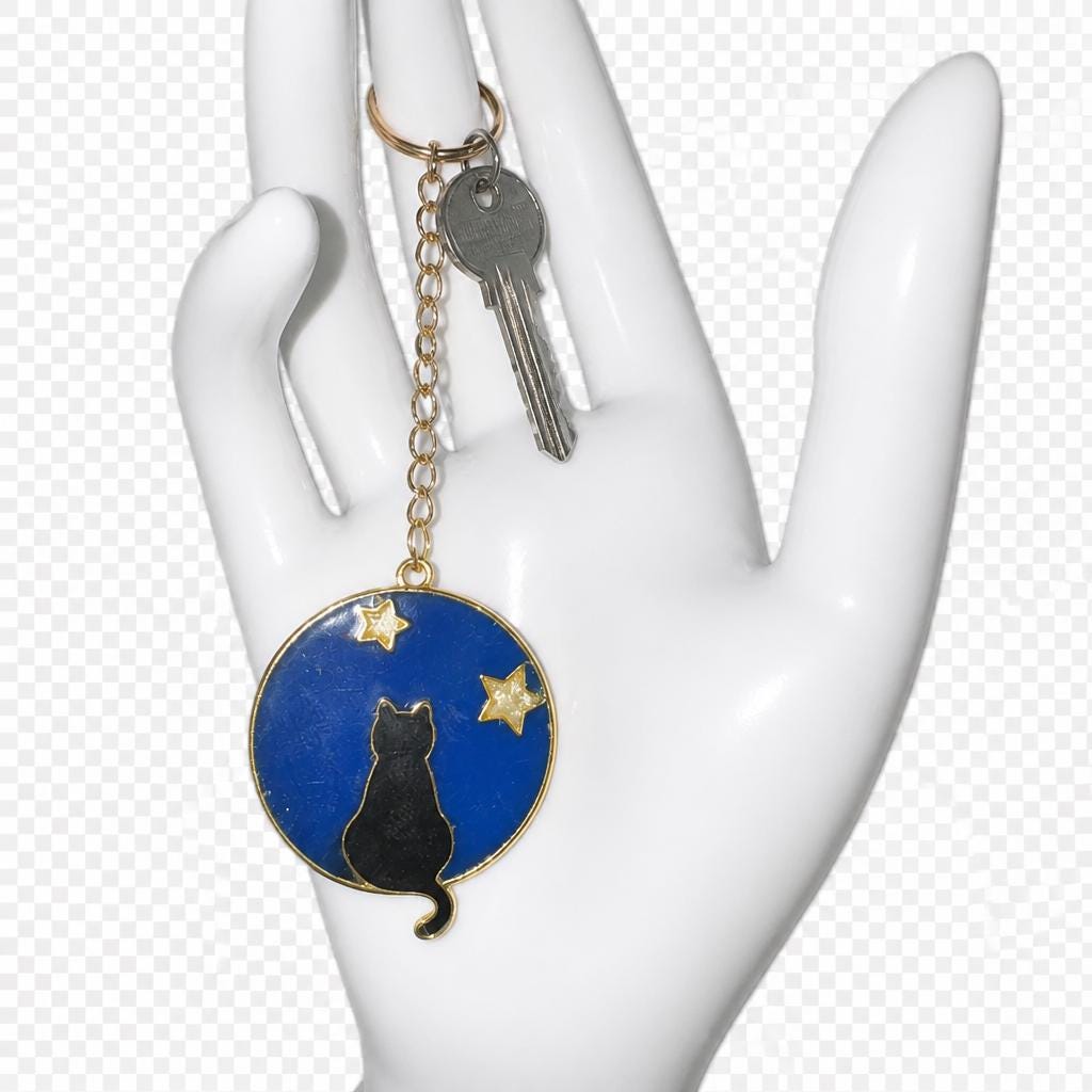 Handmade resin keyrings with metal bezel