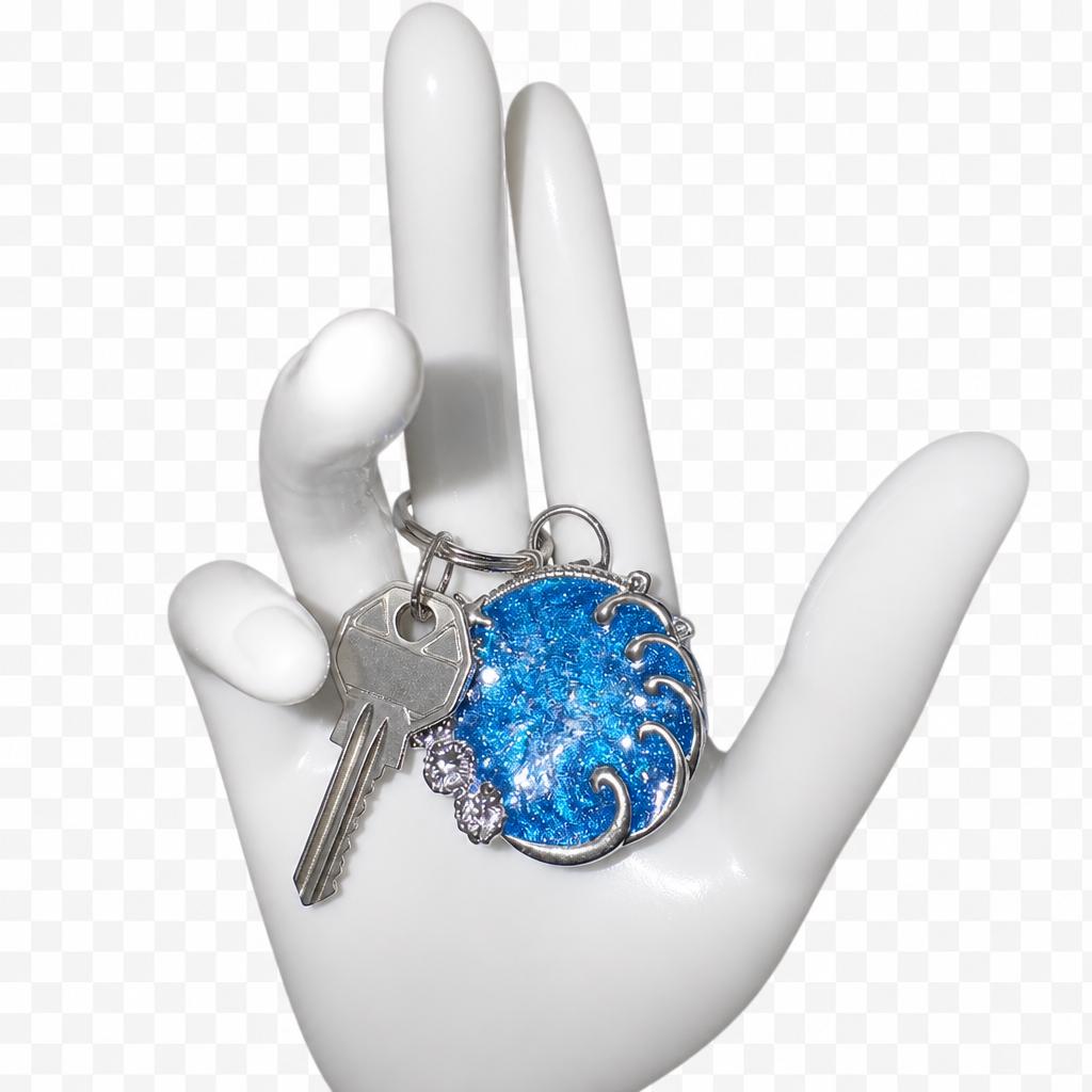 Handmade resin keyrings with metal framing